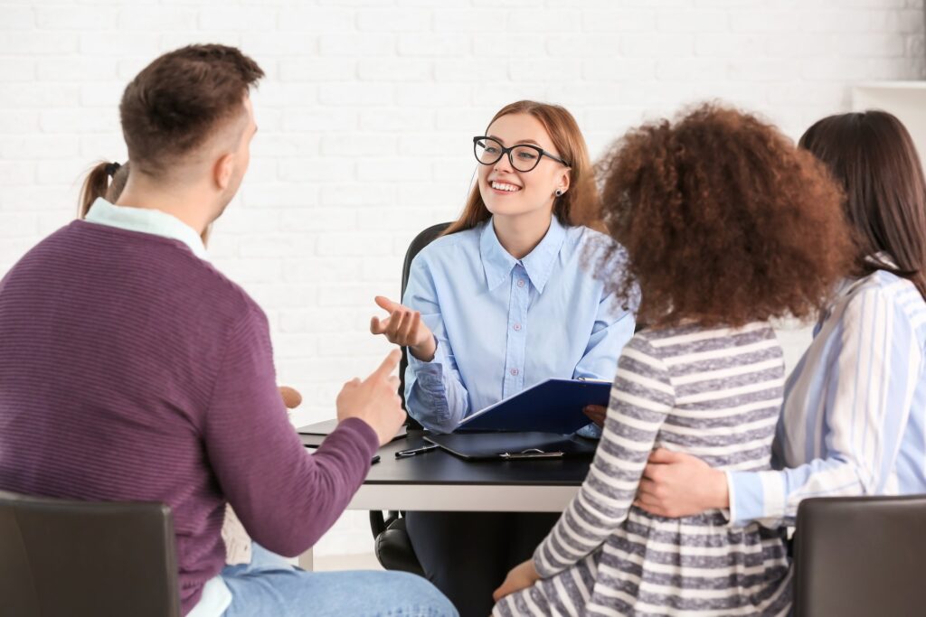 Adoption lawyer meeting with prospective adoptive family during consultation in Central Missouri to discuss the adoption process